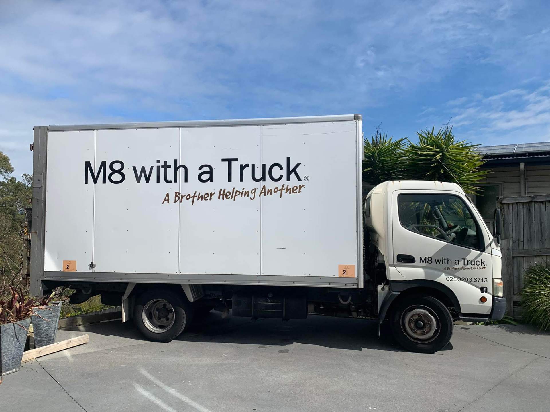 A Brother Helping Another — right there on the truck.